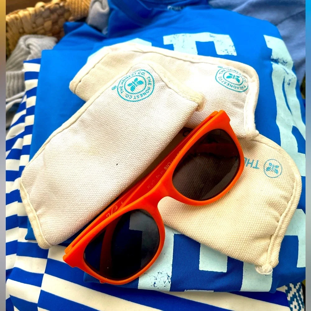 The Honest Company kids orange sunglasses with eyeglass case (two cases).